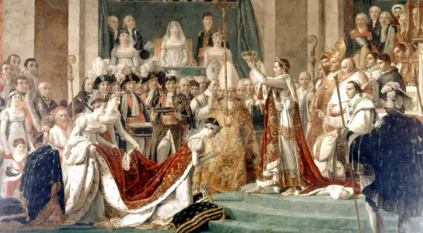 Le sacre de Napoléon 1er. Joséphine, agenouillée, reçoit la couronne. Une scène grandiose de l'Empire français.