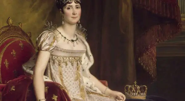 Portrait de Joséphine Bonaparte, impératrice, parée de bijoux, assise sur un trône, rappelant son union avec Napoléon.