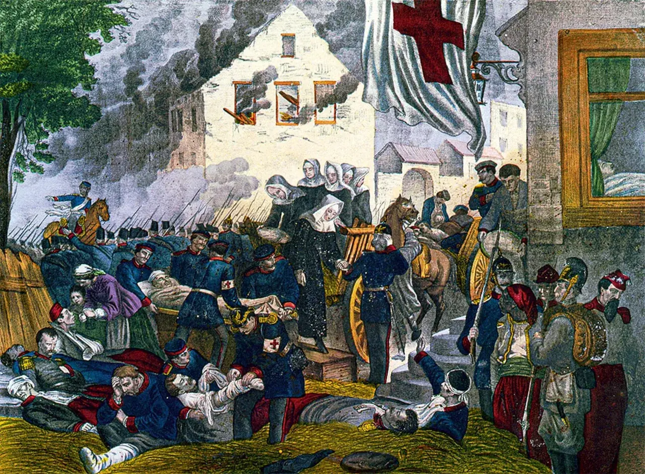 Scène de guerre avec des blessés soignés par des religieuses sous le regard d'un drapeau à la croix rouge, évoquant la croix rouge origine.