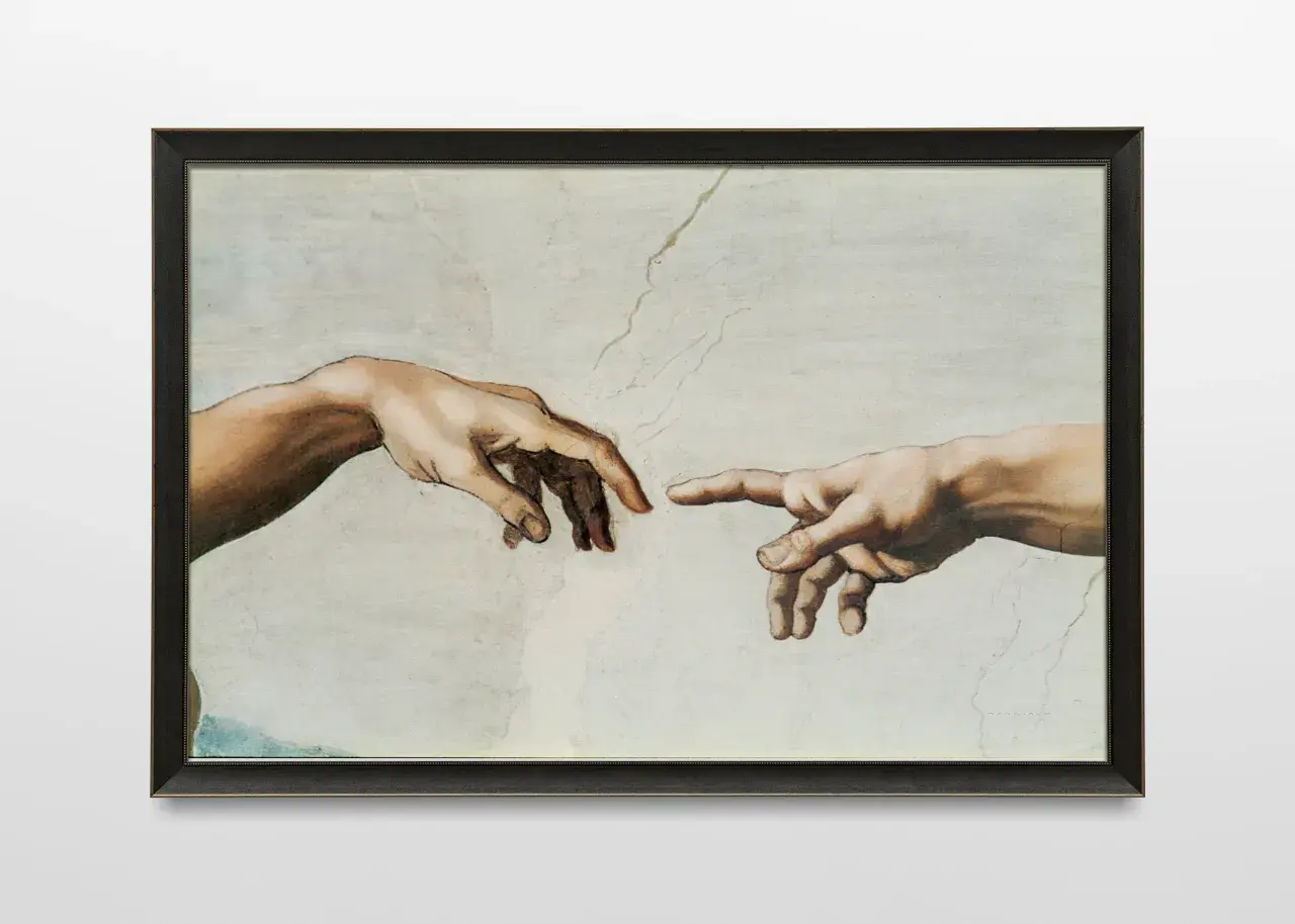 La création d'Adam par Michel-Ange : deux mains se tendent, symbolisant le souffle de vie. La signification des mains de Michel-Ange est profonde.