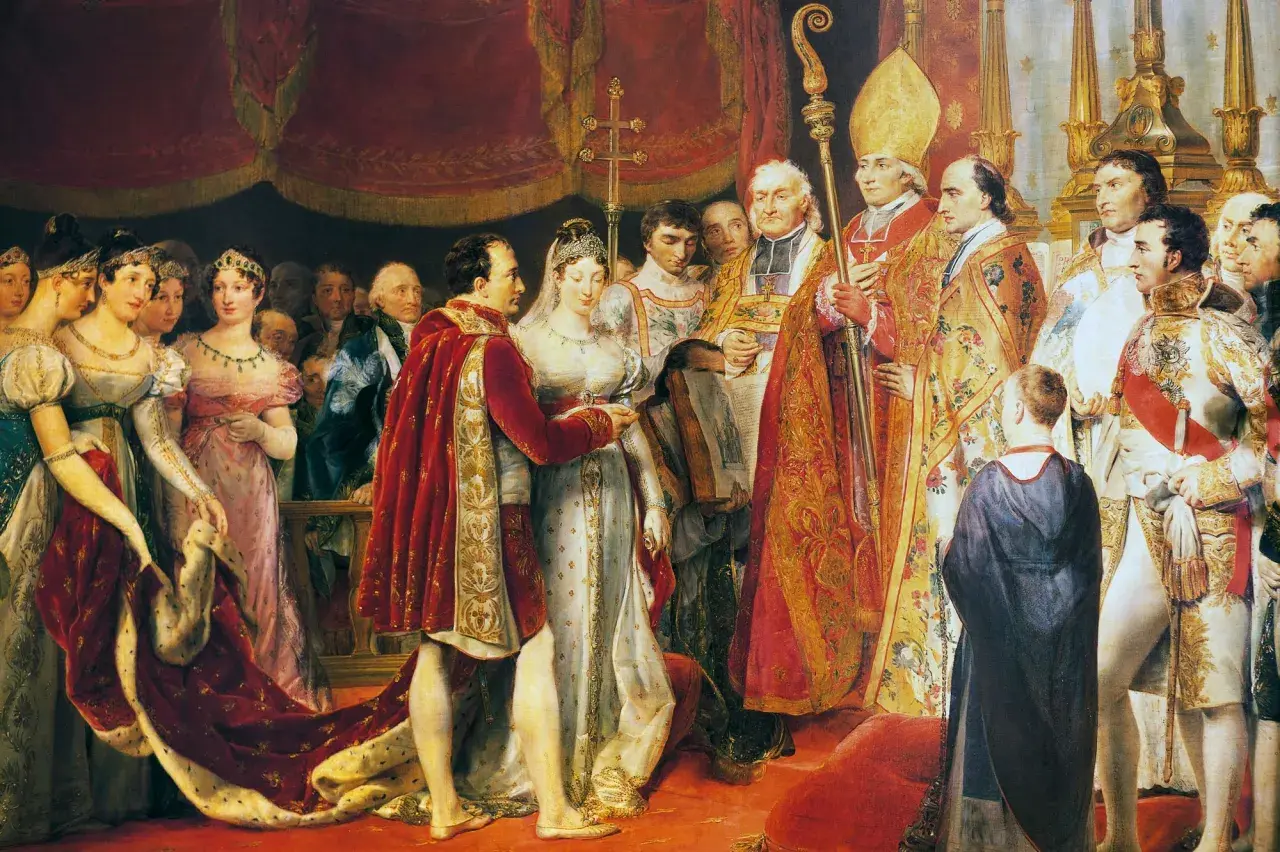 Le couronnement de Napoléon et Marie-Louise, entourés de dignitaires et de la famille impériale.
