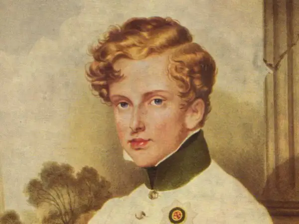 Portrait du jeune Napoléon II, roi de Rome, aux cheveux blonds bouclés et aux yeux bleus, portant un uniforme militaire.