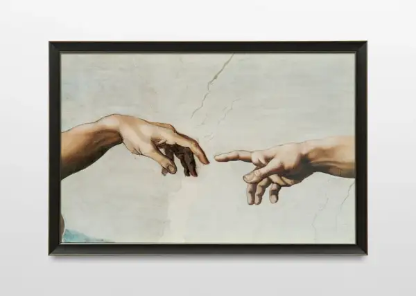 La création d'Adam par Michel-Ange : deux mains se tendent, symbolisant le souffle de vie. La signification des mains de Michel-Ange est profonde.