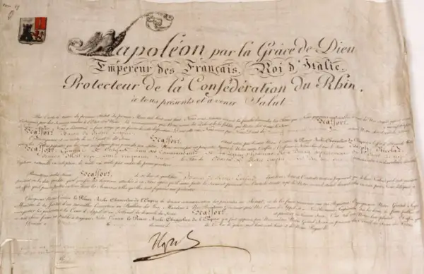 Document ancien avec sceau et signature, mentionnant Napoléon et la Confédération du Rhin.